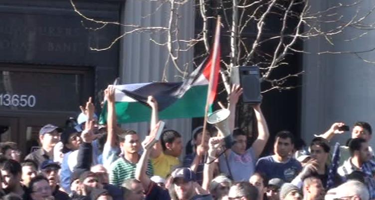 People - Dearborn Muslims wave Palestinian Flag